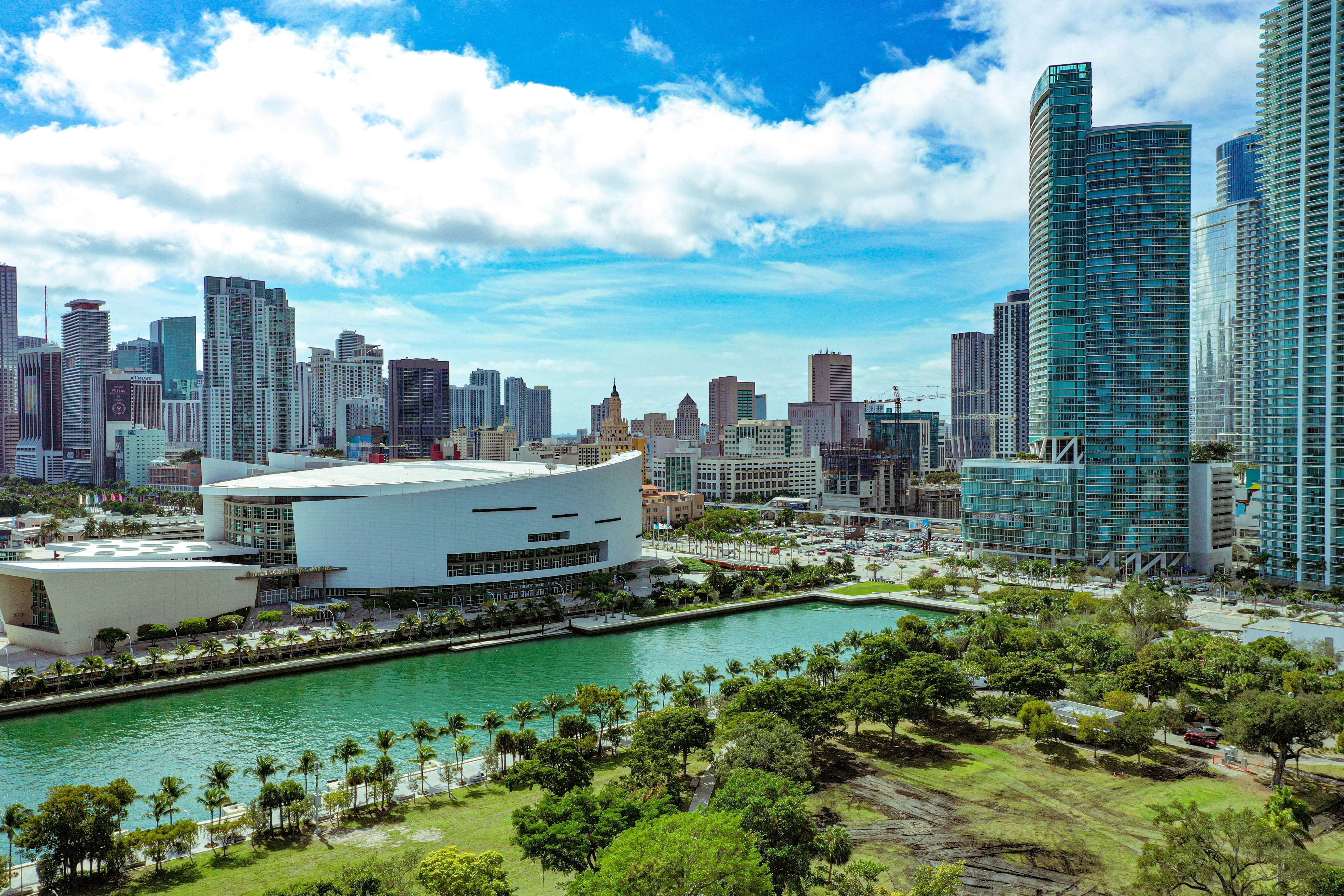 Aerial view of the Miami skyline with waterway and luxury towers